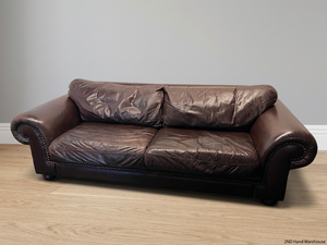 Coricraft Brown Leather 2 Seater Couch with Stud Detail — Broken Zip on Seat Cushion – styled product image