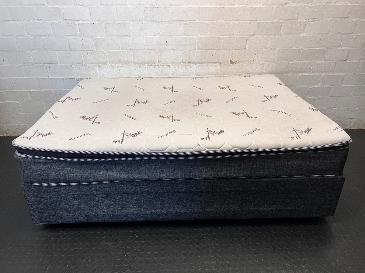 Queen Bamboo Pattern Mattress and Grey Upholstered Base — Mattress in Poor Condition; Base Shows Wear – side view