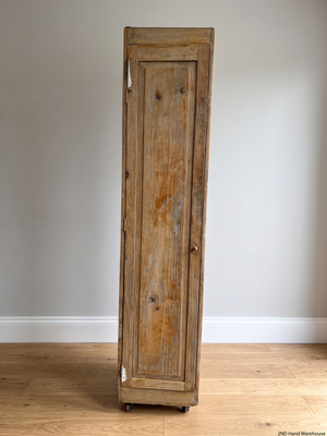 Tall Narrow Wooden Wardrobe on Wheels — Well Used Condition – styled product image