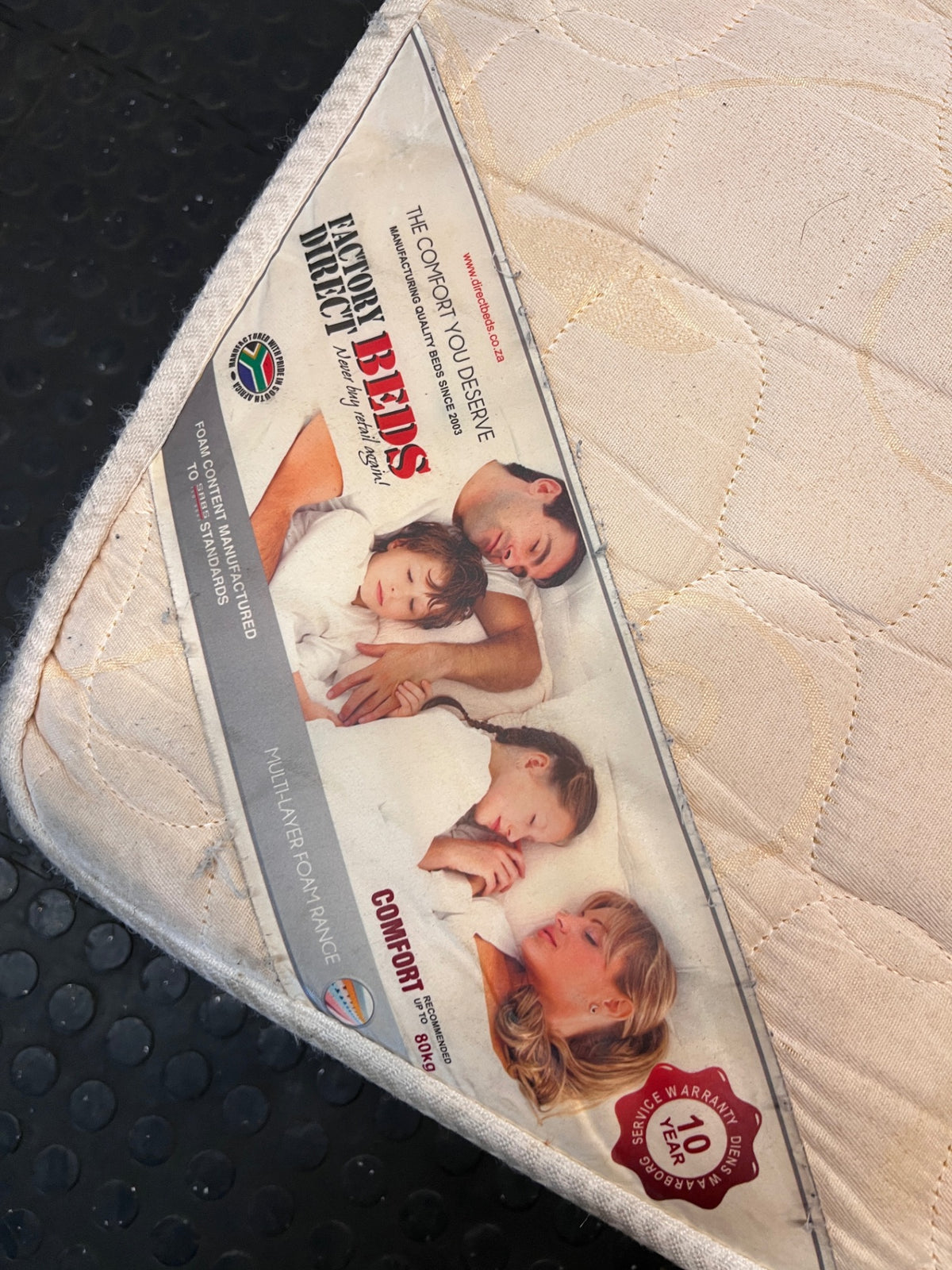 Quilted Beige Queen Mattress — Good Working Order – top view