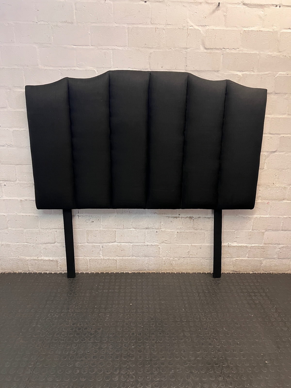 Upholstered Fluted Black Double Headboard — Good Working Order – main front view