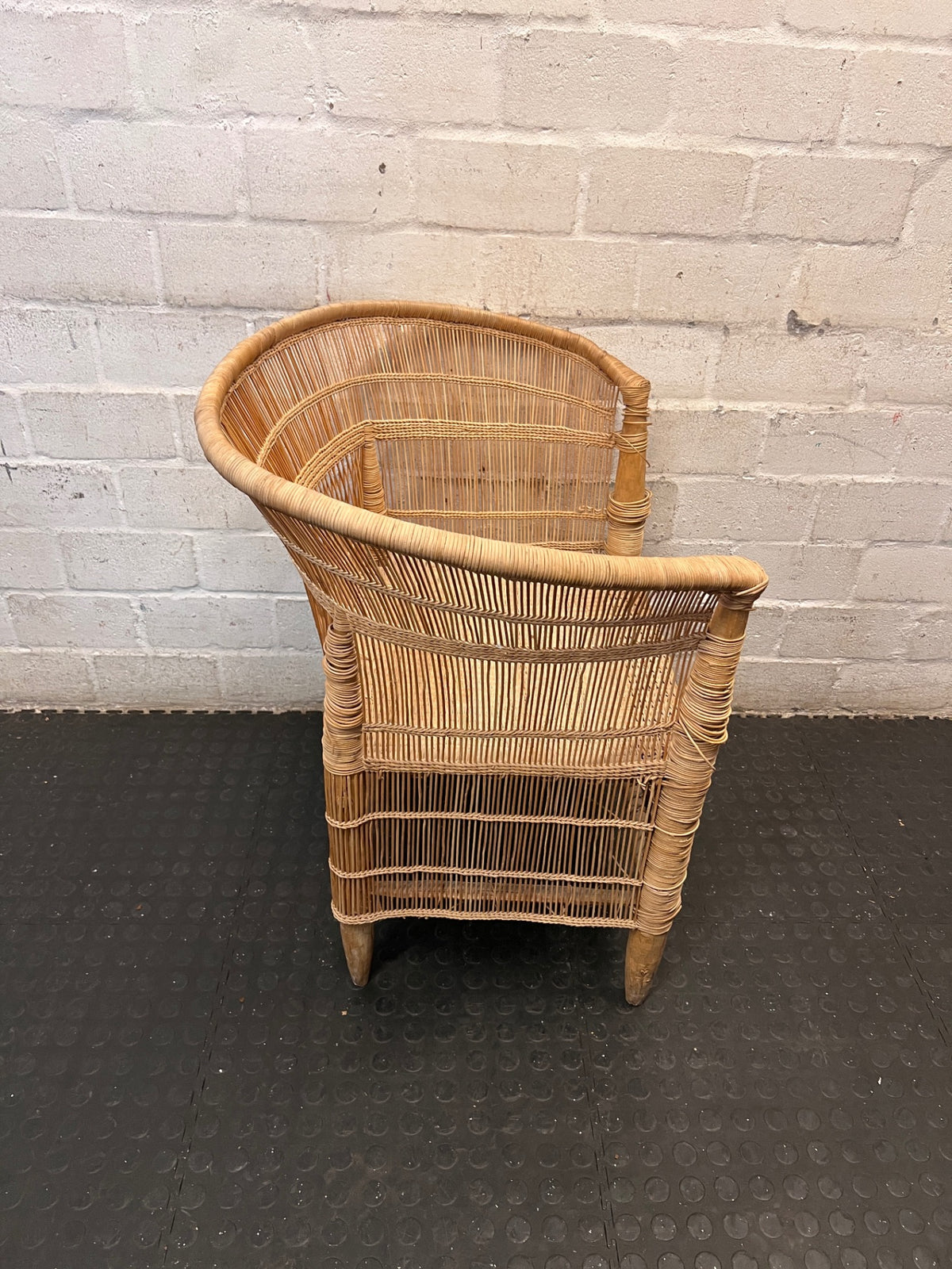 Woven Wicker Tub Chair — Well Used Condition – back view