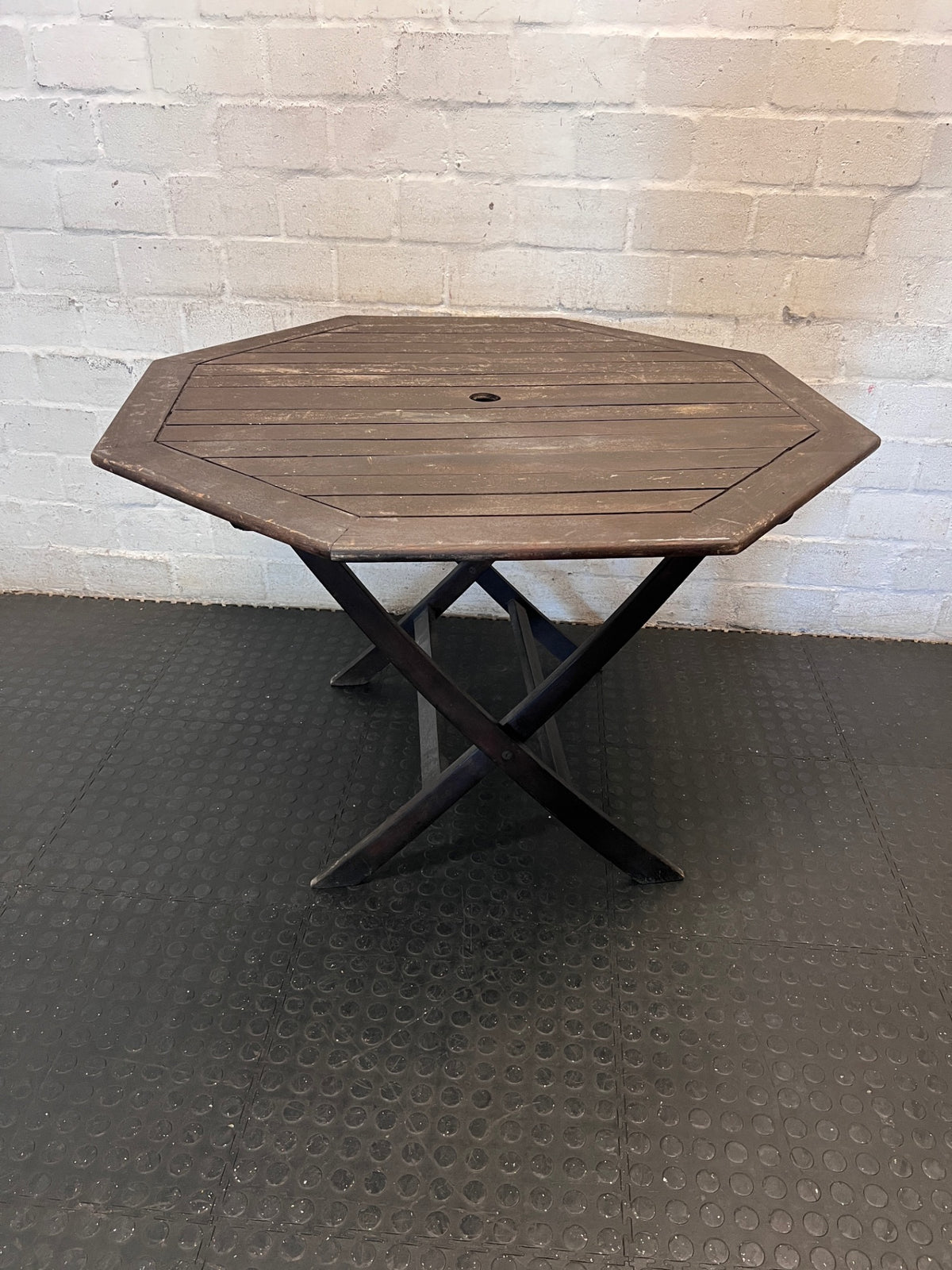 Hexagonal Slatted Wood Outdoor Table with Parasol Hole — Well Used with Faded Surface Finish – back view