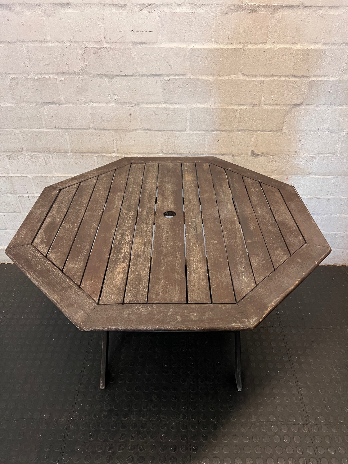Hexagonal Slatted Wood Outdoor Table with Parasol Hole — Well Used with Faded Surface Finish – side view