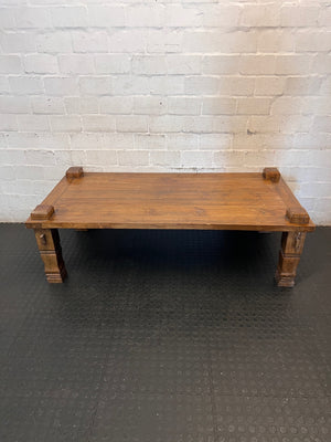 Solid Wooden Coffee Table with Carved Chunky Legs — Visible Wear Throughout – condition detail