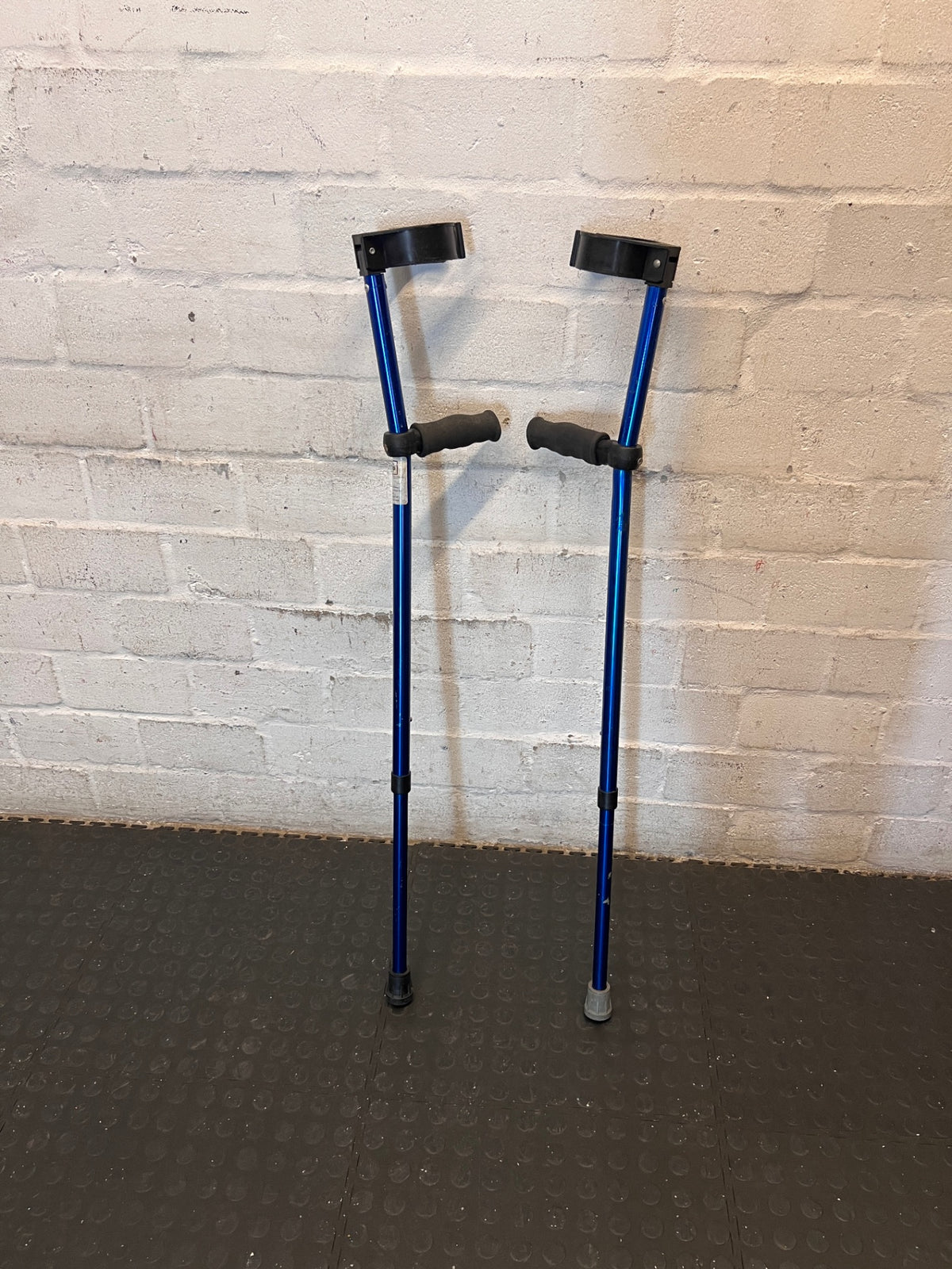 Blue Metallic Adjustable Forearm Crutch — Visible Wear and Scuffing – main front view