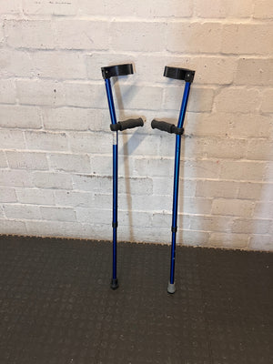 Blue Metallic Adjustable Forearm Crutch — Visible Wear and Scuffing – main front view