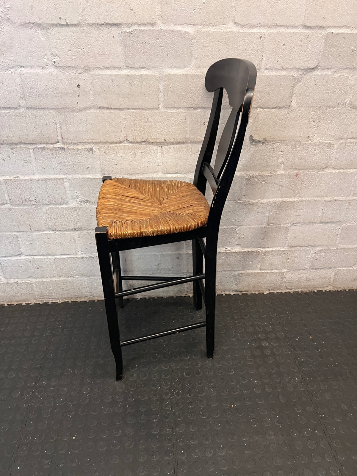Black T-Back Dining Chair with Woven Seat — Fair Condition with Visible Wear – condition detail