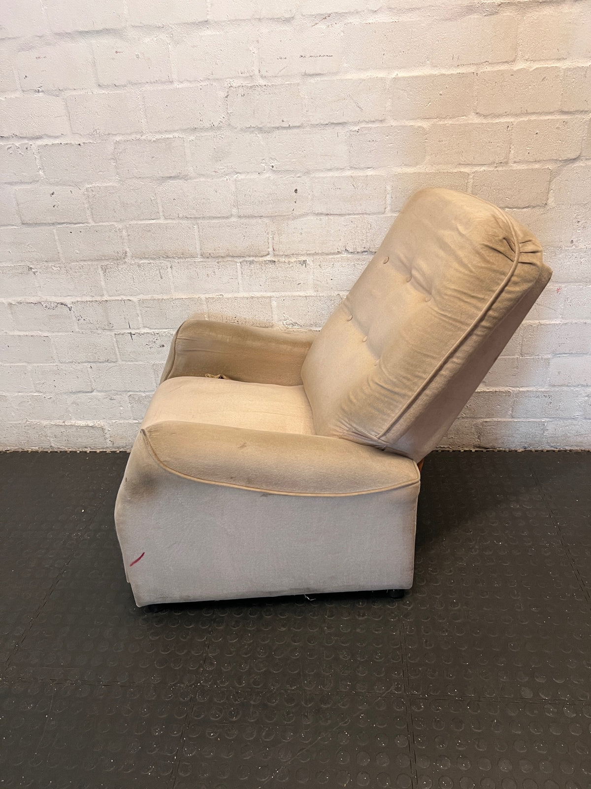 Beige Button-Tufted One-Seater Couch — Worn Upholstery with Small Tear – side view