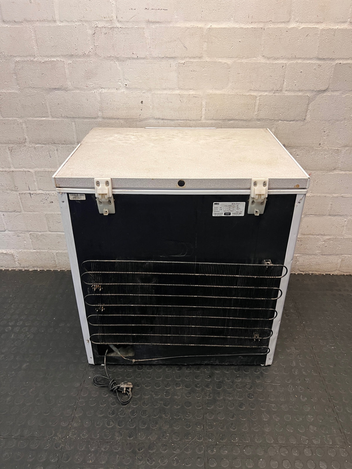 KIC White Chest Freezer — Good Working Order with Exterior Dents – back view