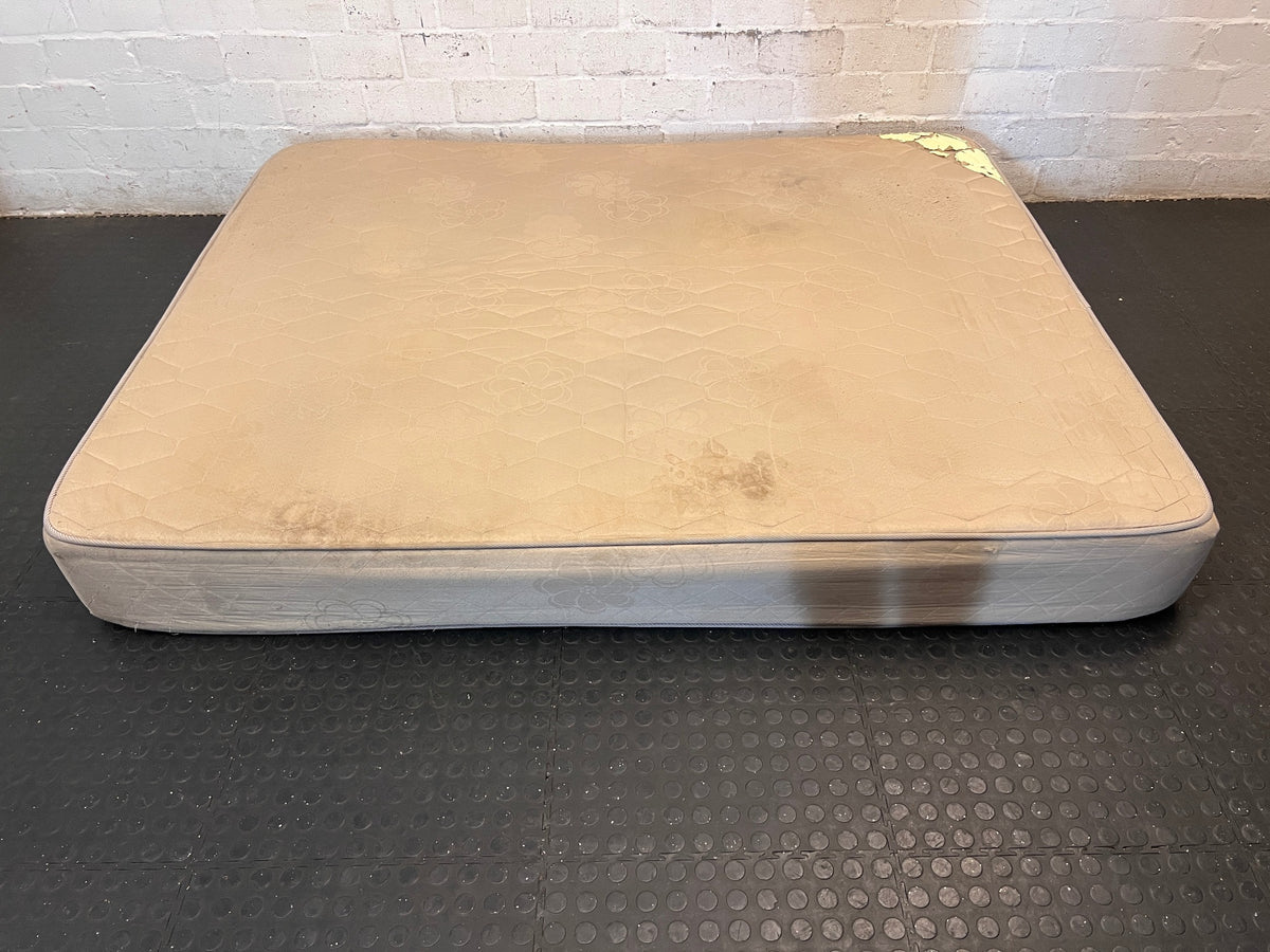 Beige Quilted Double Bed Mattress — Heavy Staining and Torn Corner Fabric – back view