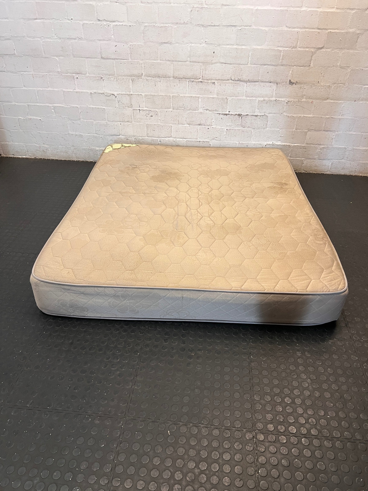 Beige Quilted Double Bed Mattress — Heavy Staining and Torn Corner Fabric – condition detail