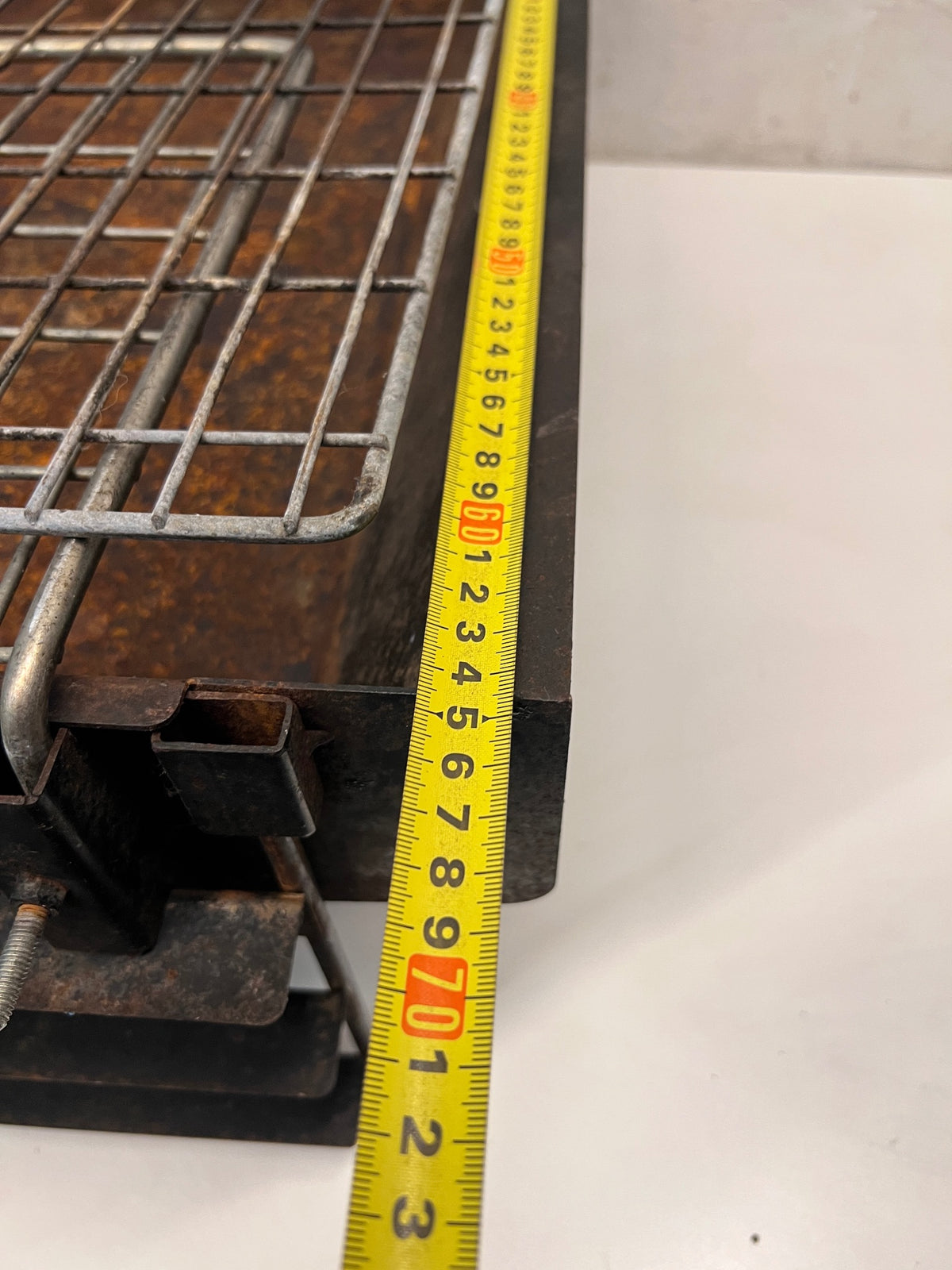 Compact Metal Wood-Burning Braai Stand with Grid — Significant Surface Rust and Heavy Wear – width measurement