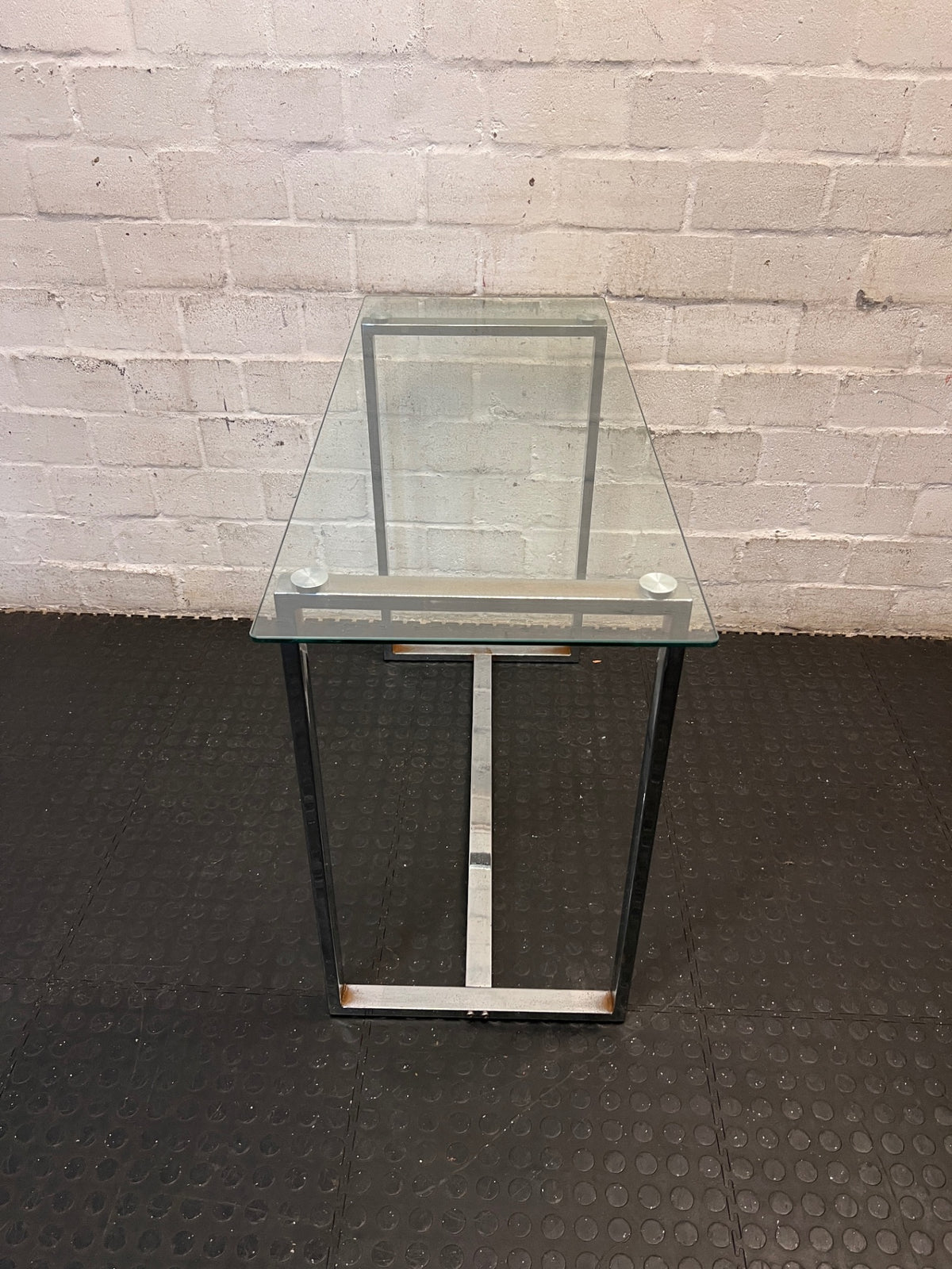 Contemporary Glass Top Console Table with Chrome Frame — Permanent Mark on Glass Surface – back view