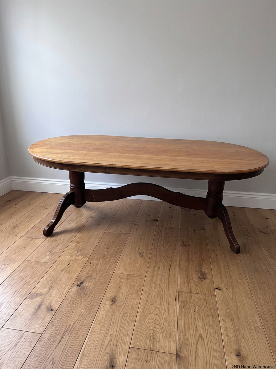 Oval Two-Tone Wooden Dining Table with Trestle Base — Good Working Order with Additional Items Included – styled product image