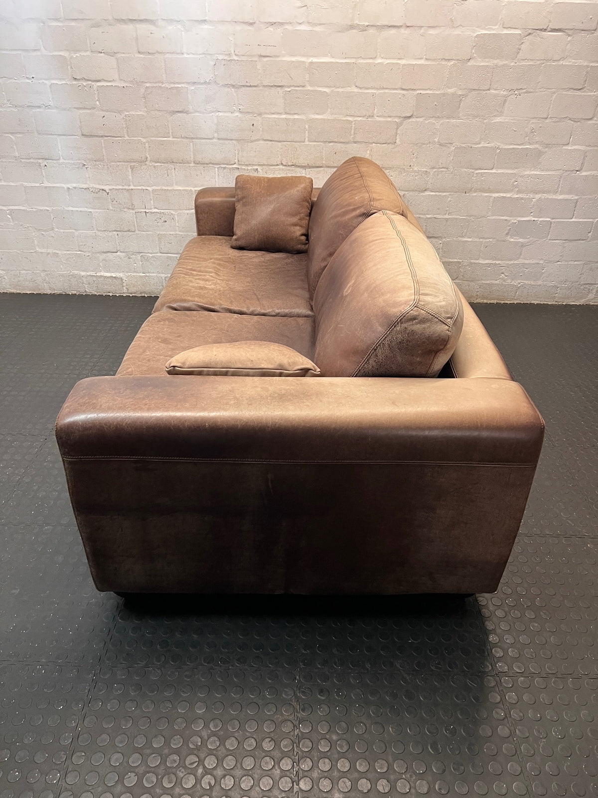 3 Seater Coricraft Leather Couch — Good Working Order – side view