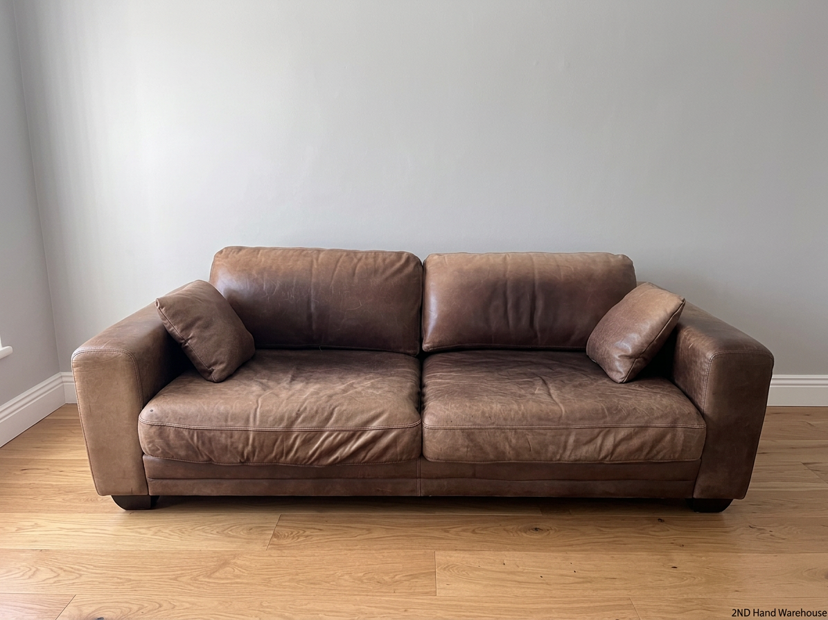 3 Seater Coricraft Leather Couch — Good Working Order – styled product image