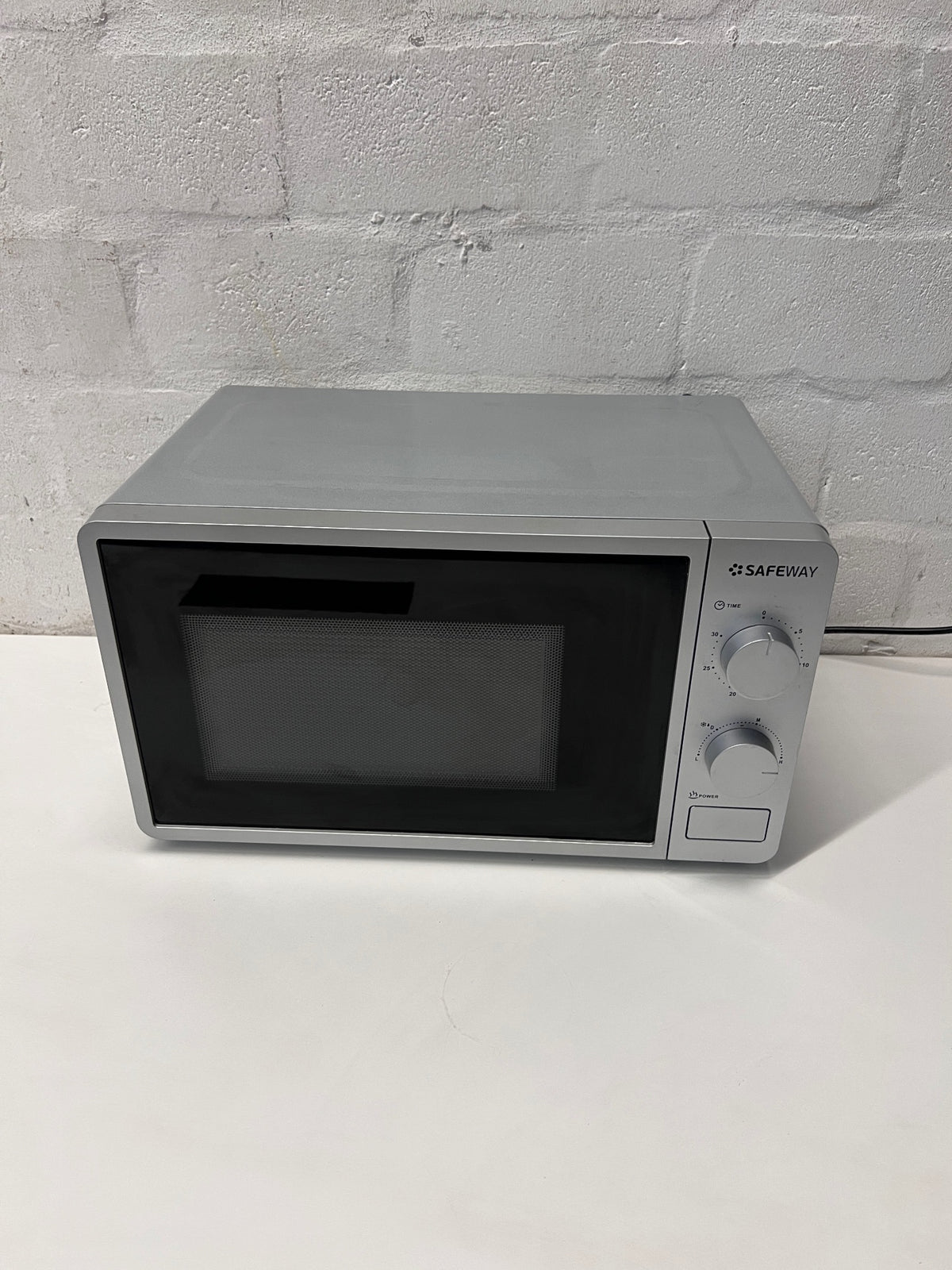 Safeway Countertop Microwave in Silver Finish — Good Working Order – main front view