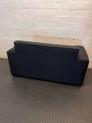 Black Synthetic Polyester 2 Seater Couch — Stains on Material; Good Functionality – condition detail