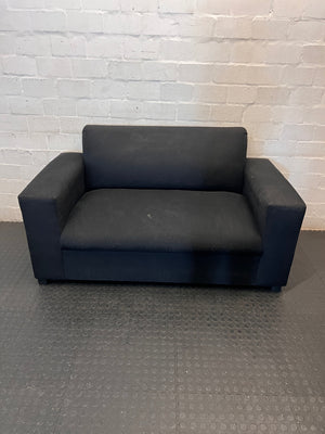 Black Synthetic Polyester 2 Seater Couch — Stains on Material; Good Functionality – main front view