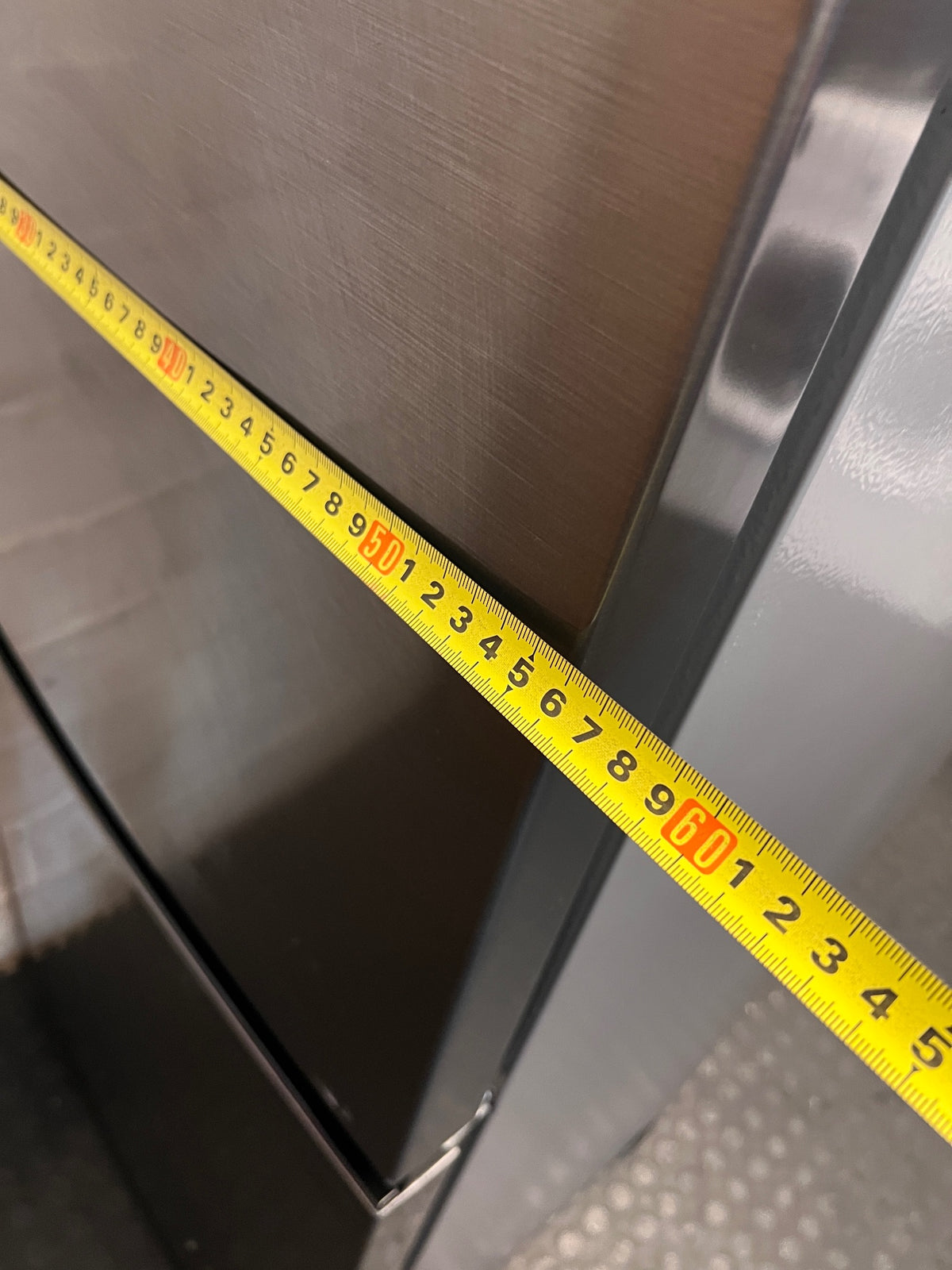Hisense Bottom-Mount Fridge-Freezer in Grey — Working with Visible Surface Dents and Scuffs – depth measurement