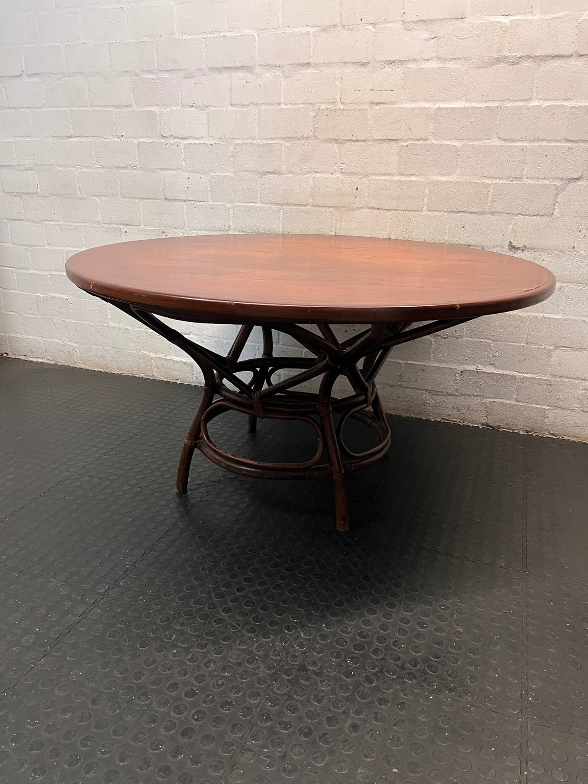 Round Wooden Dining Table with Rattan Style Base — Fair Condition with Visible Wear – condition detail
