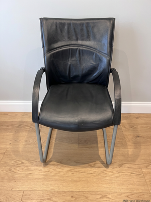 Black Upholstered Visitor Chair with Metal Sleigh Base – styled product image