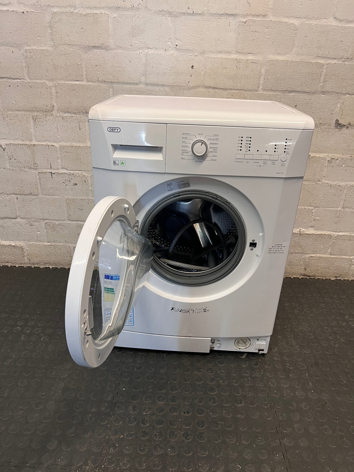 Defy 6kg White Front Loader Washing Machine — Door Hard to Close and Missing Drain Cover – side view