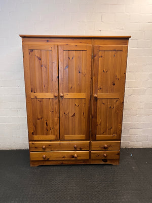 Three-Door Oregon Pine Wardrobe with Drawers — Very Good Condition – main front view