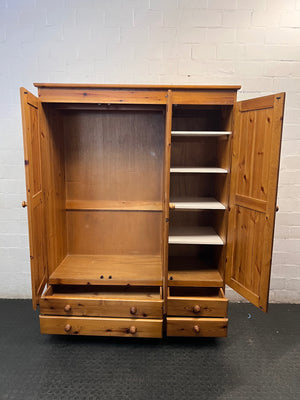 Three-Door Oregon Pine Wardrobe with Drawers — Very Good Condition – side view