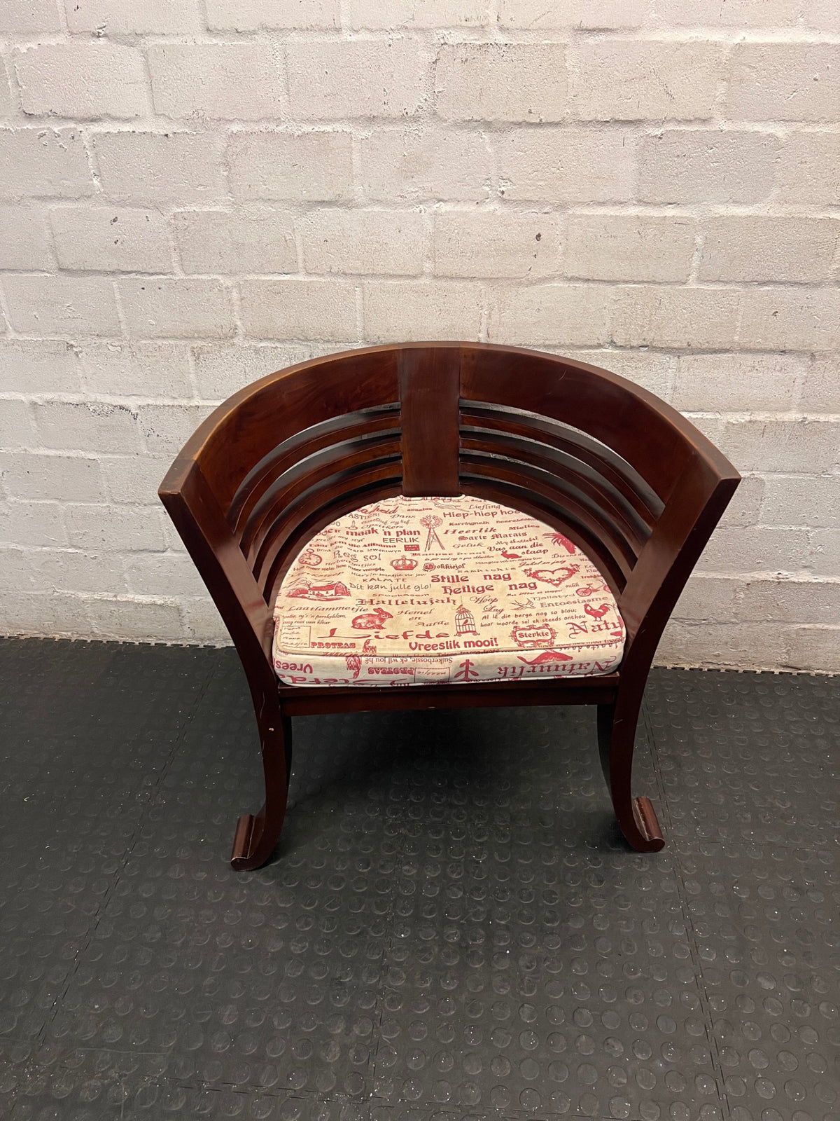 Dark Wood Bali Tub Chair with Scripted Cushion — Good Condition – main front view