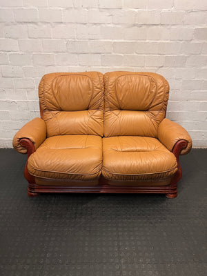 Tan Brown 2 Seater Couch with Carved Wooden Base — Good Condition – main front view