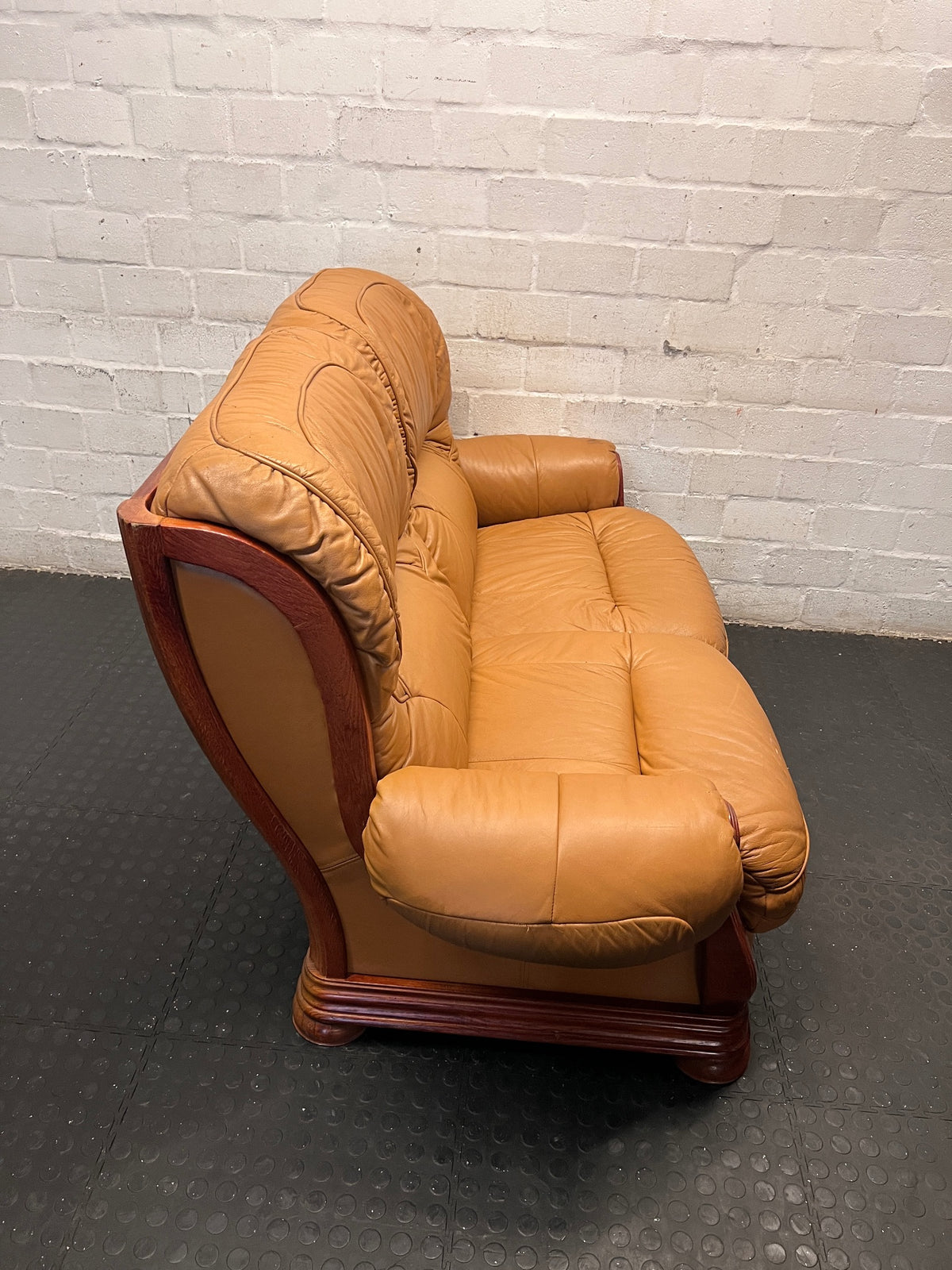 Tan Brown 2 Seater Couch with Carved Wooden Base — Good Condition – top view