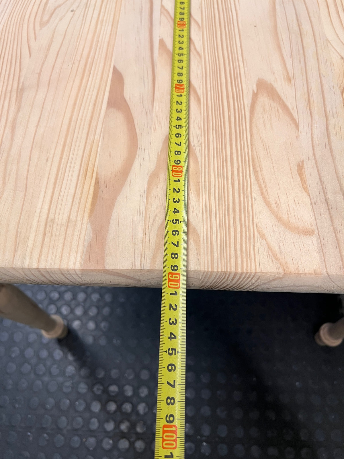 Square Pine Dining Table with Turned Legs — Feet Not Properly Installed – depth measurement