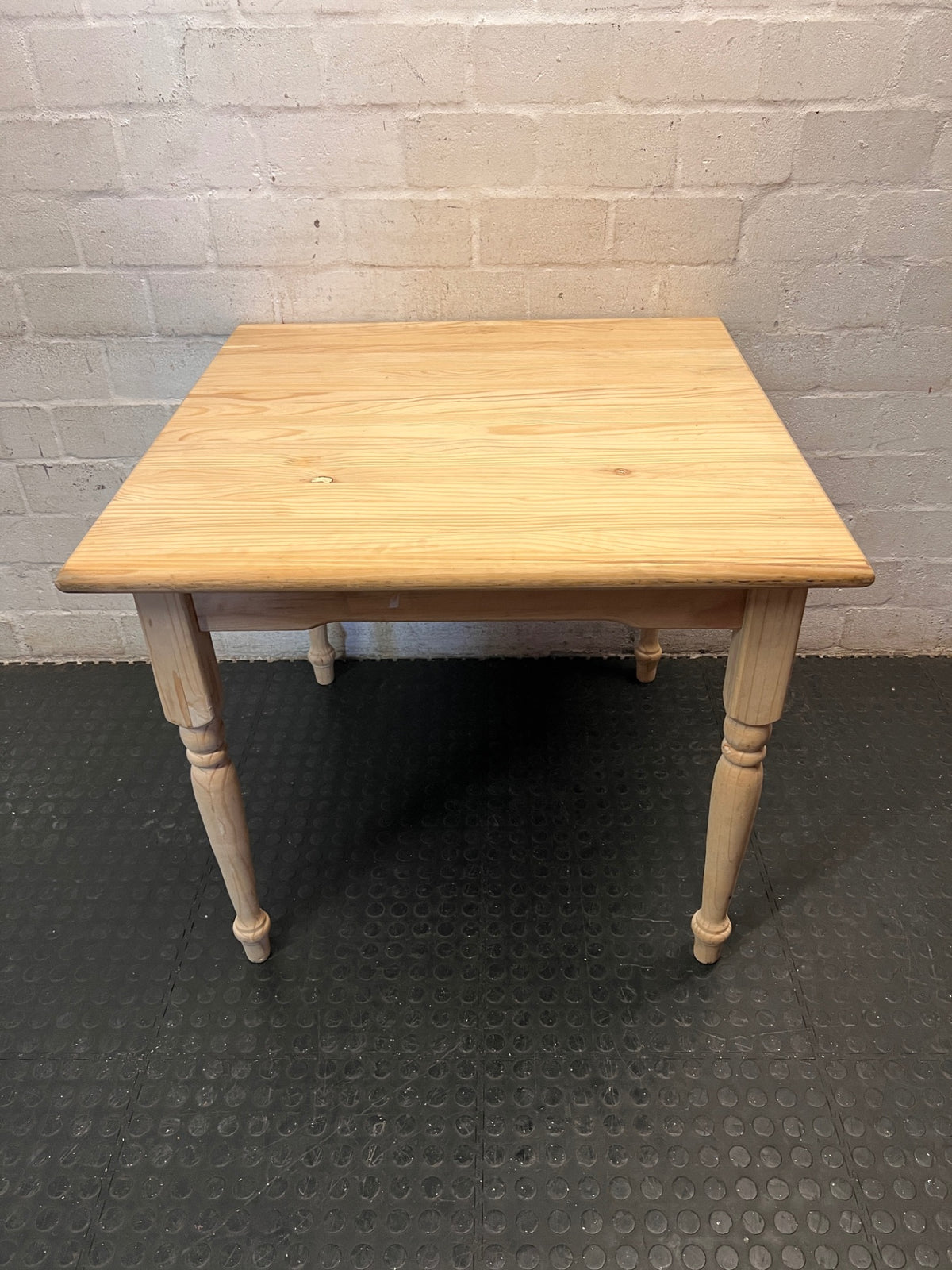 Square Pine Dining Table with Turned Legs — Feet Not Properly Installed – side view