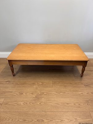 Large Honey-Toned Wooden Coffee Table with Turned Legs – styled product image