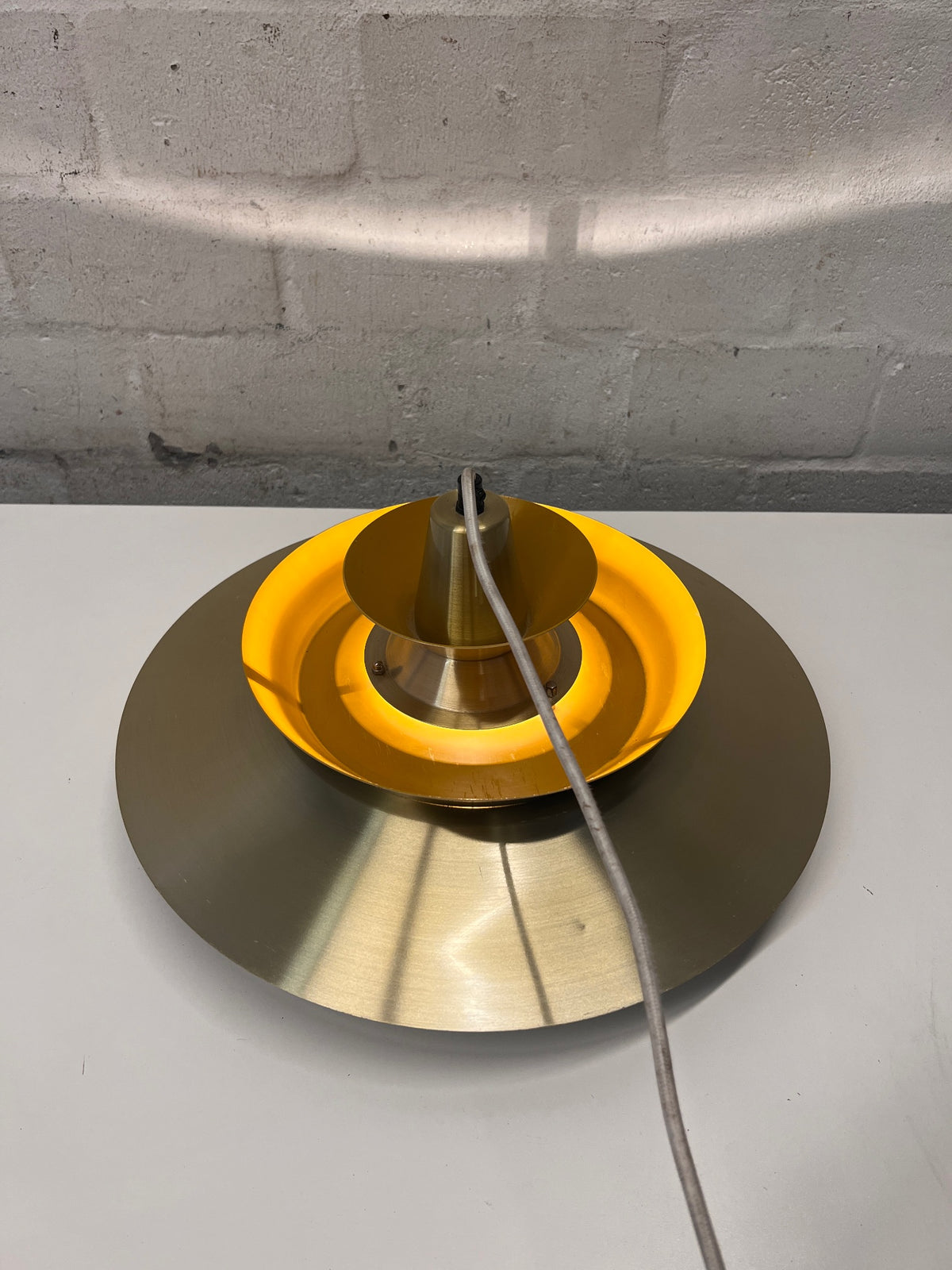 Tiered Gold and Yellow Metallic Pendant Light – main front view