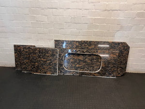 Polished Brown Mottled Stone Countertop with Sink Cutout – back view
