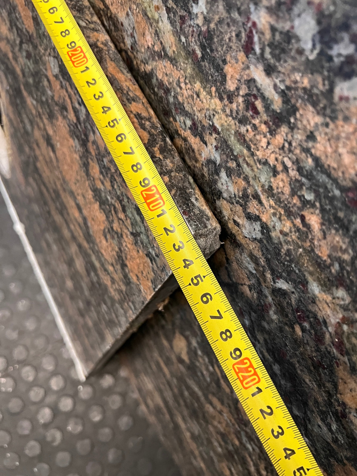 Polished Brown Mottled Stone Countertop with Sink Cutout – depth measurement