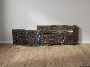 Polished Brown Mottled Stone Countertop with Sink Cutout – styled product image