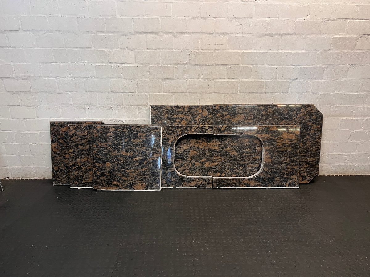 Polished Brown Mottled Stone Countertop with Sink Cutout – top view