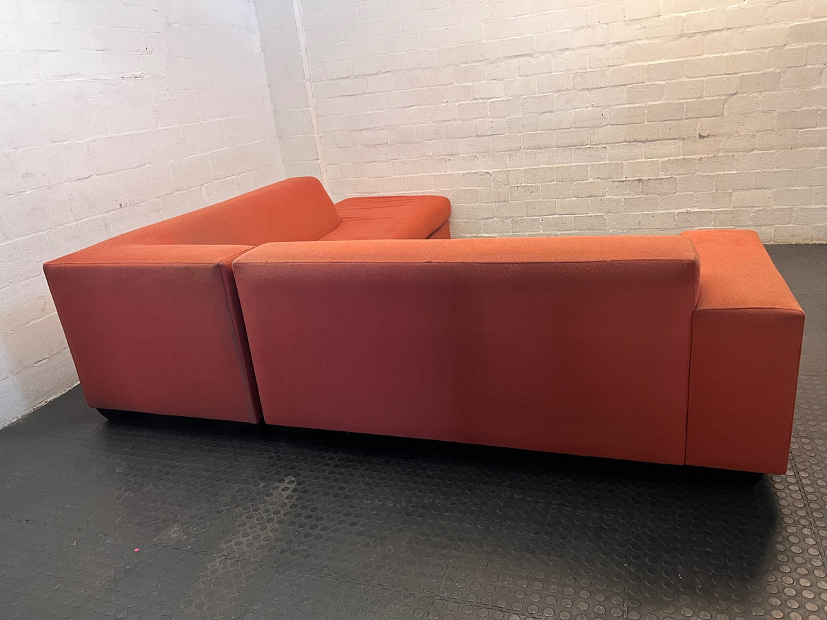 Large Coral Fabric L-Shape Sectional Couch — Visible Wear and Marks – condition detail