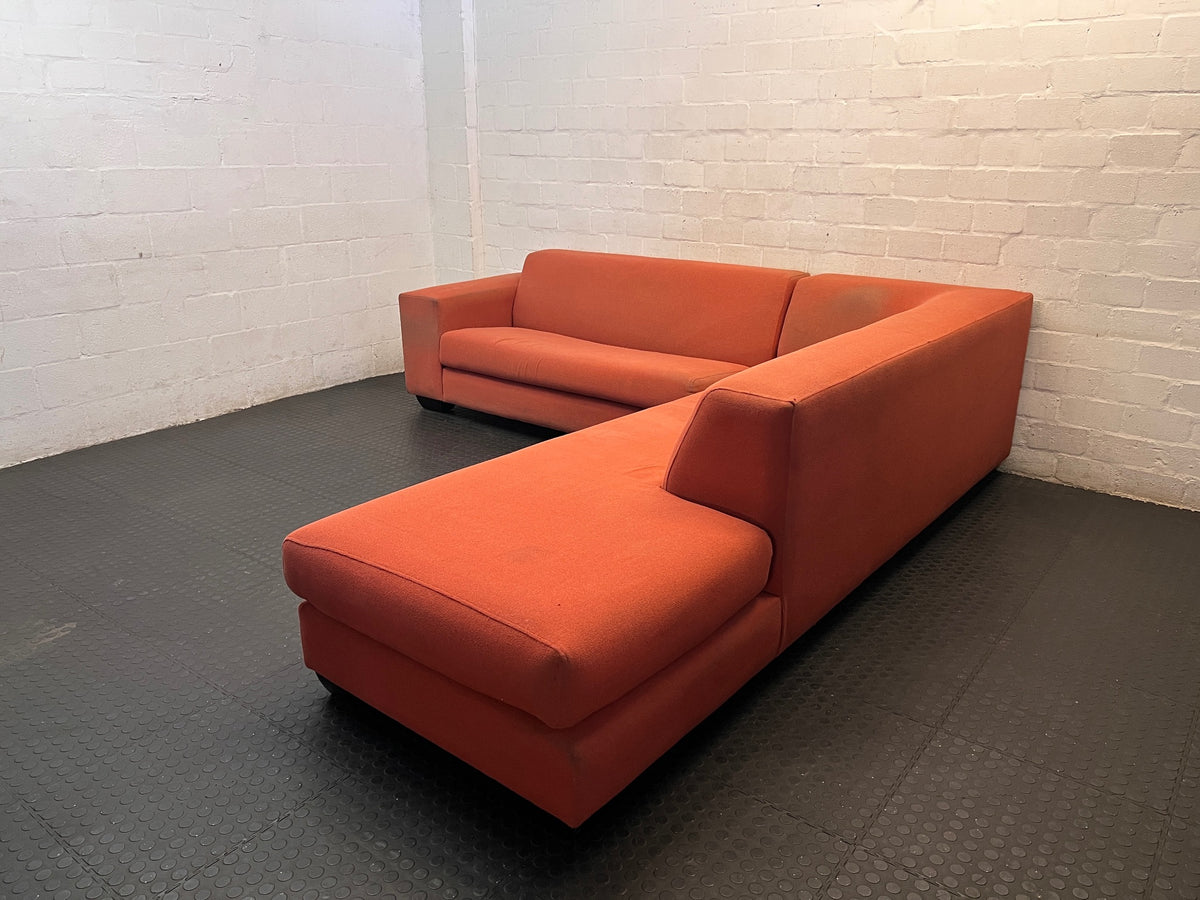 Large Coral Fabric L-Shape Sectional Couch — Visible Wear and Marks – top view