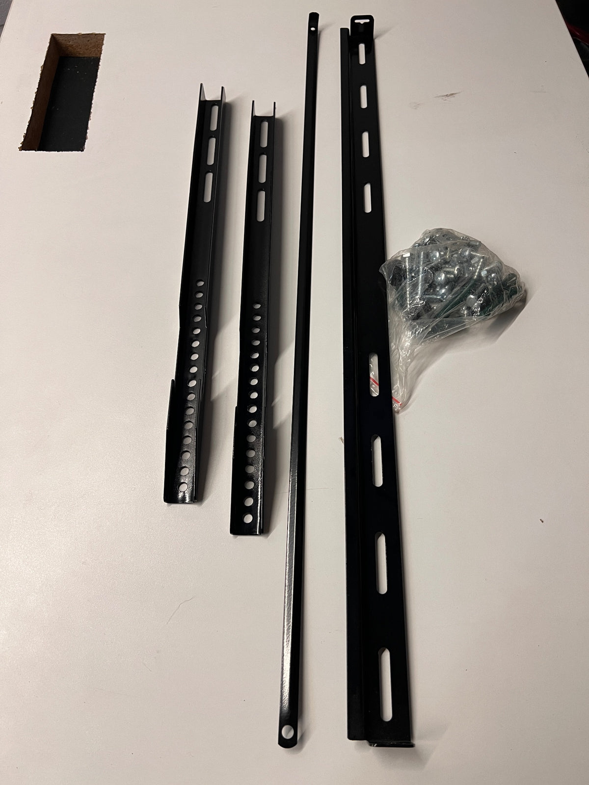 Black Metal TV Wall Mount Bracket with Hardware – main front view