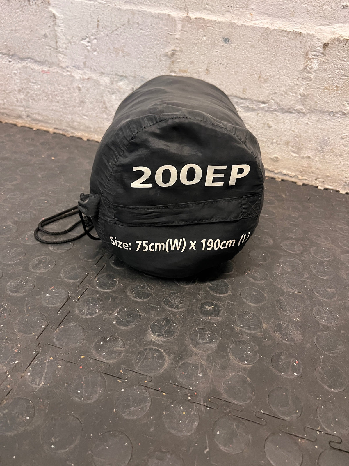 Black Rectangular 200EP Sleeping Bag — Fair Condition With Signs of Wear – back view