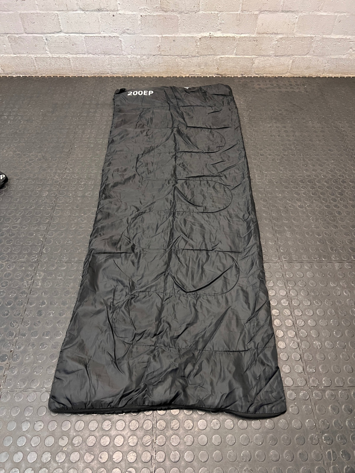Black Rectangular 200EP Sleeping Bag — Fair Condition With Signs of Wear – main front view