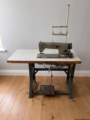 Industrial Sewing Machine on Workstation Table — Good Working Order – styled product image