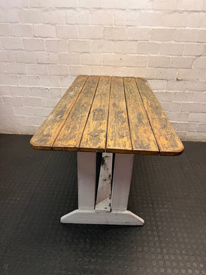 Rustic Wooden Trestle Garden Table — Weather Soiled Wood Surface – back view