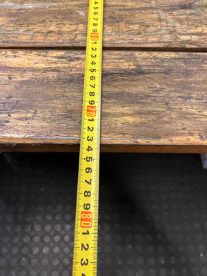 Rustic Wooden Trestle Garden Table — Weather Soiled Wood Surface – depth measurement