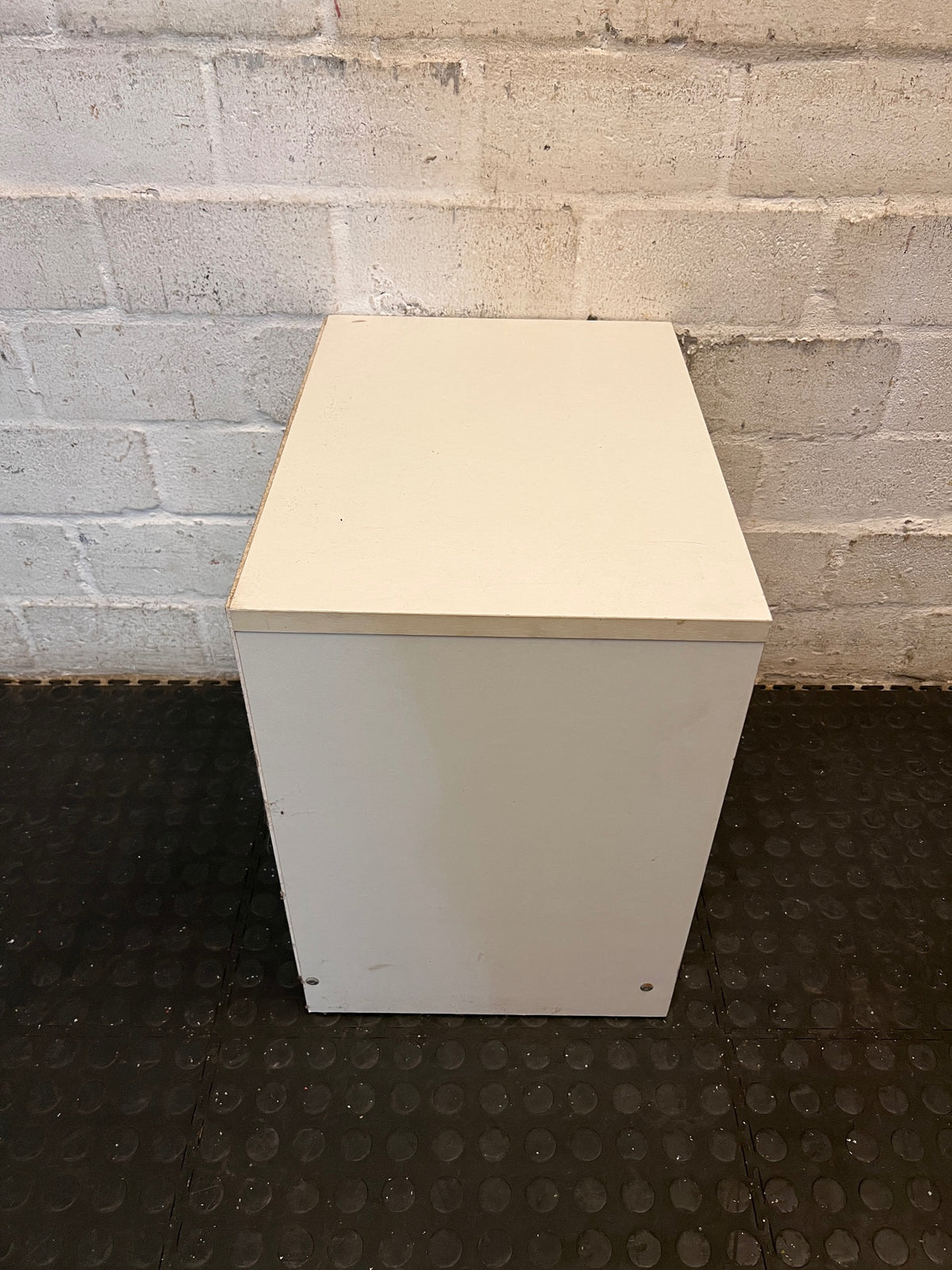 White Two-Drawer Bedside Table with Silver Handles — Scuff Marks on Drawer Front – top view